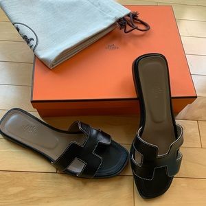 Hermes Oran sandal, black, size 7.5, original box and shoe dust bags included.